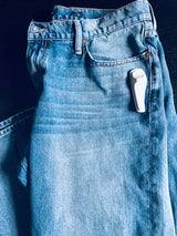 Sensormatic SuperTag II Gray - 58KHz (Box of 1,000), tag attached to denim jeans