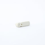 Mini Stylus Tag White (New) - Sensormatic Compatible 58KHz, top view showing pin hole