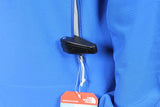 Pinless Raptor Tag Black - Checkpoint Compatible 8.2MHz, clamped onto a jacket