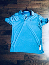 Sensormatic SuperTag I Gray - 58KHz, attached to the side seam of a polo shirt