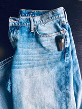 Sensormatic SuperTag III Black - 58KHz, attached to jeans beside the front pocket