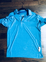 Sensormatic SuperTag III Gray - 58KHz, attached to the hem of a polo shirt