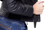 Pinless Raptor Tag Black - Checkpoint Compatible 8.2MHz, attached to a leather jacket hem on model